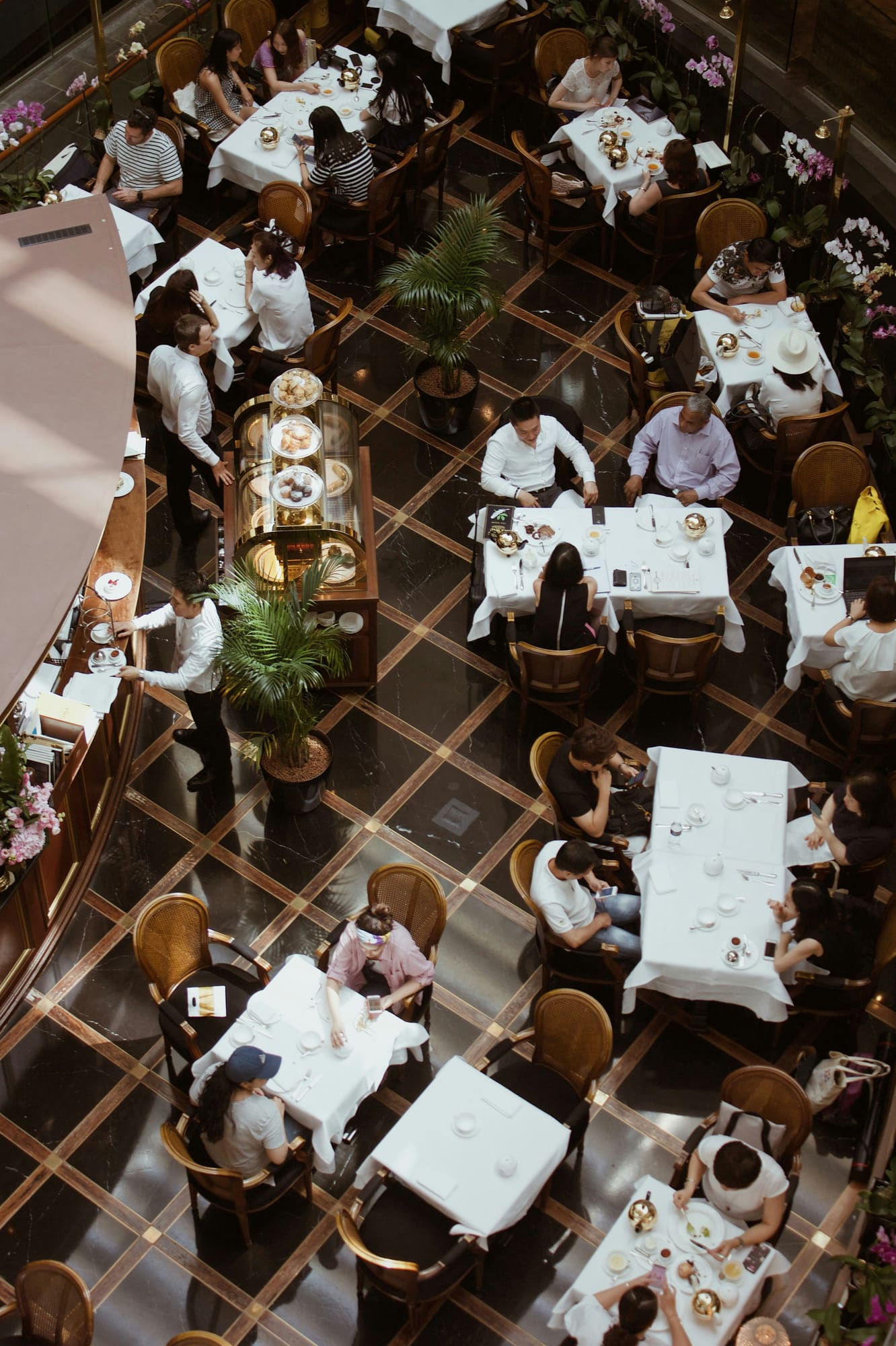 A busy restaurant seen from above — the kind of local business Bonice runs in