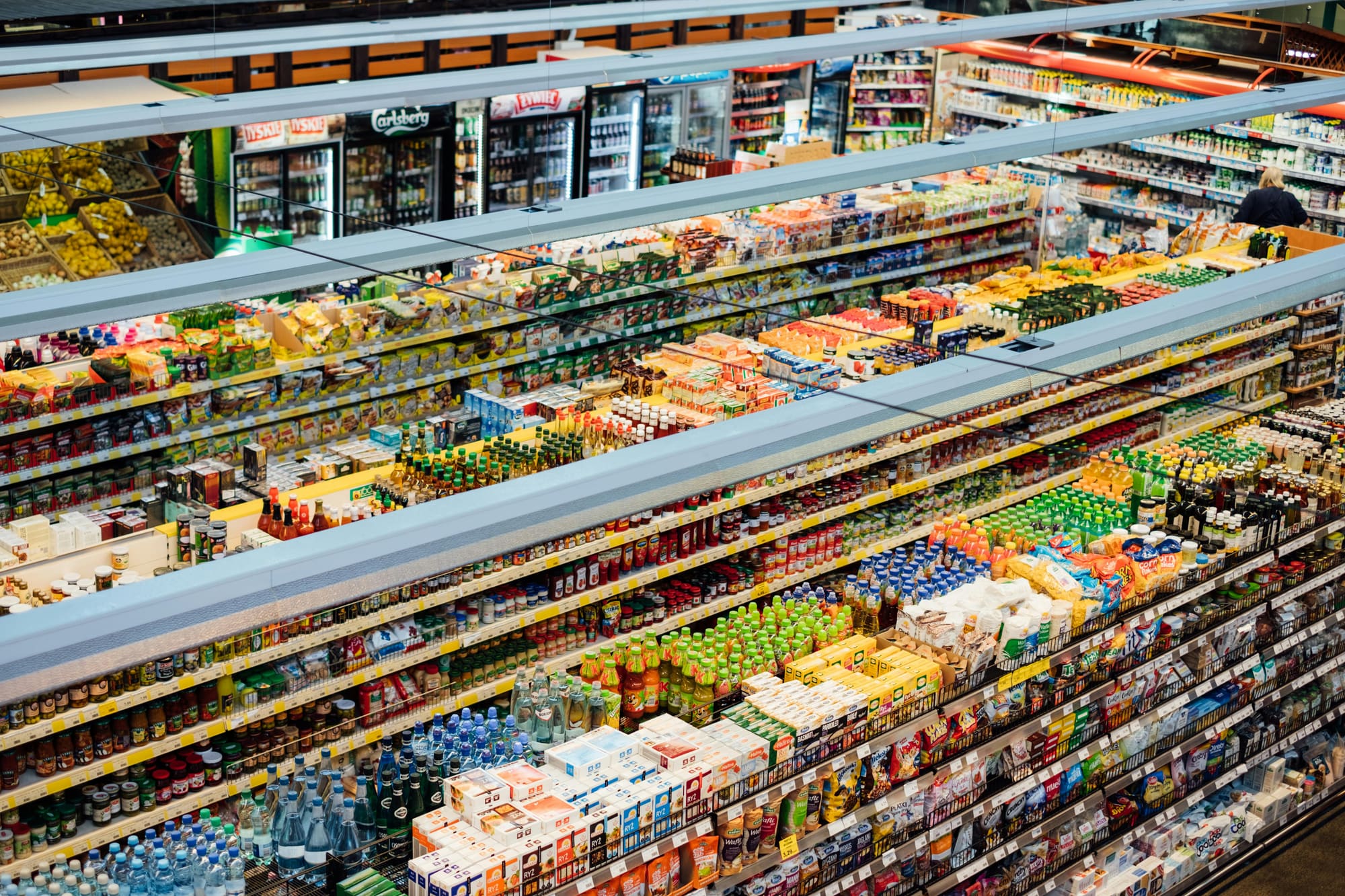 Supermarket shelves stocked with FMCG products
